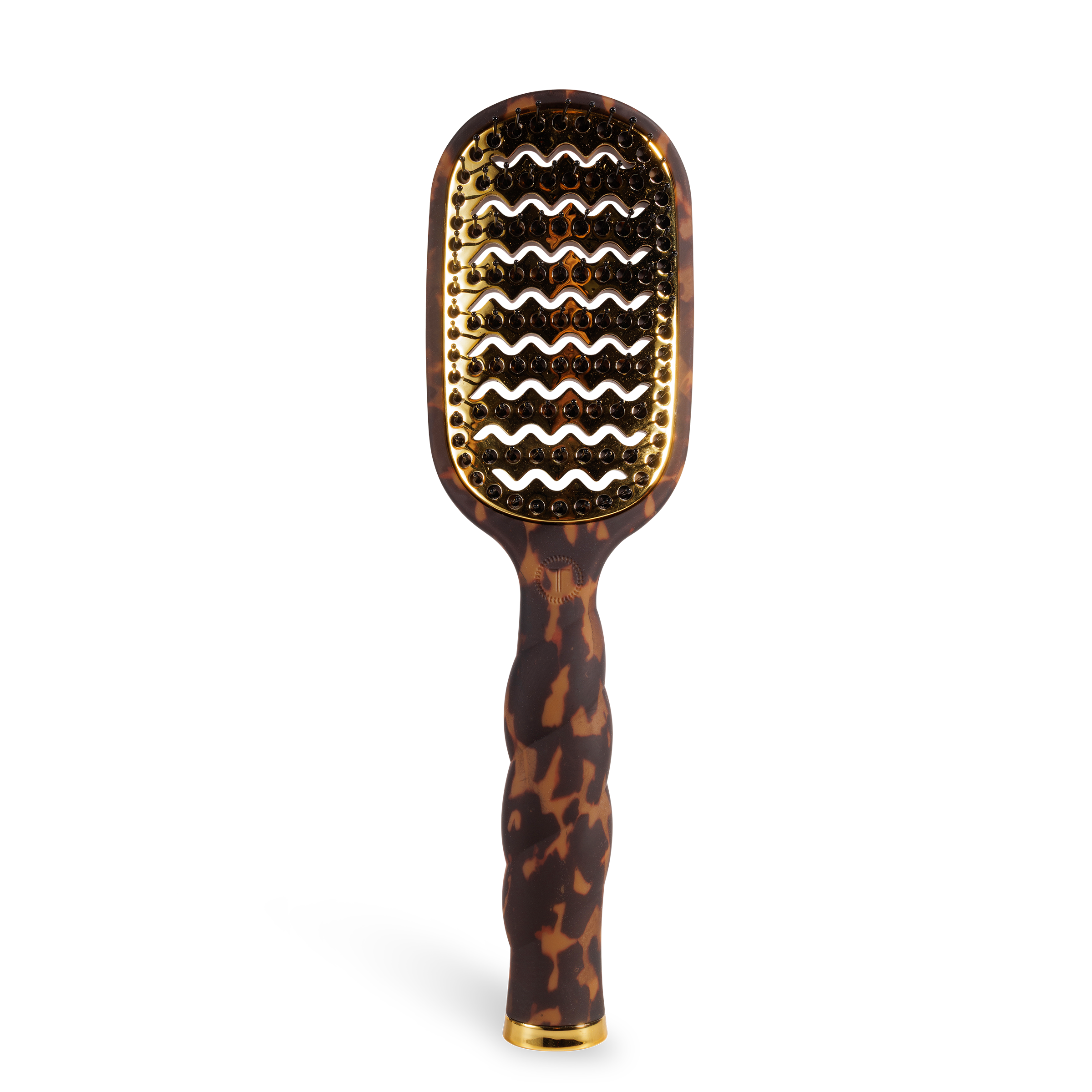 Tortoiseshell paddle hair brush on a white background