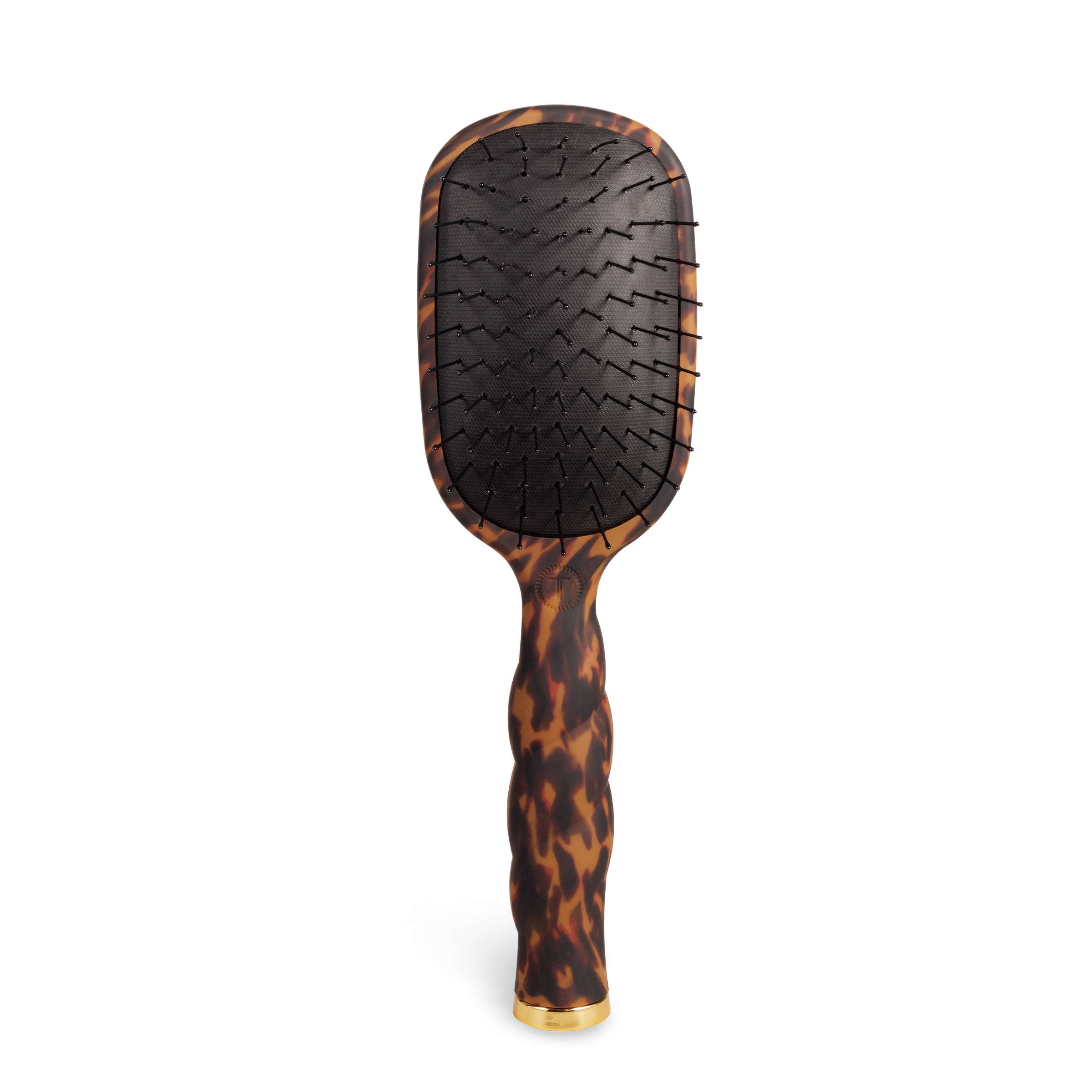 Hairbrush with tortoiseshell handle on a white background