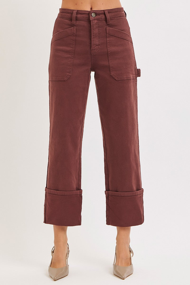 Maroon pants with rolled-up cuffs on a white background