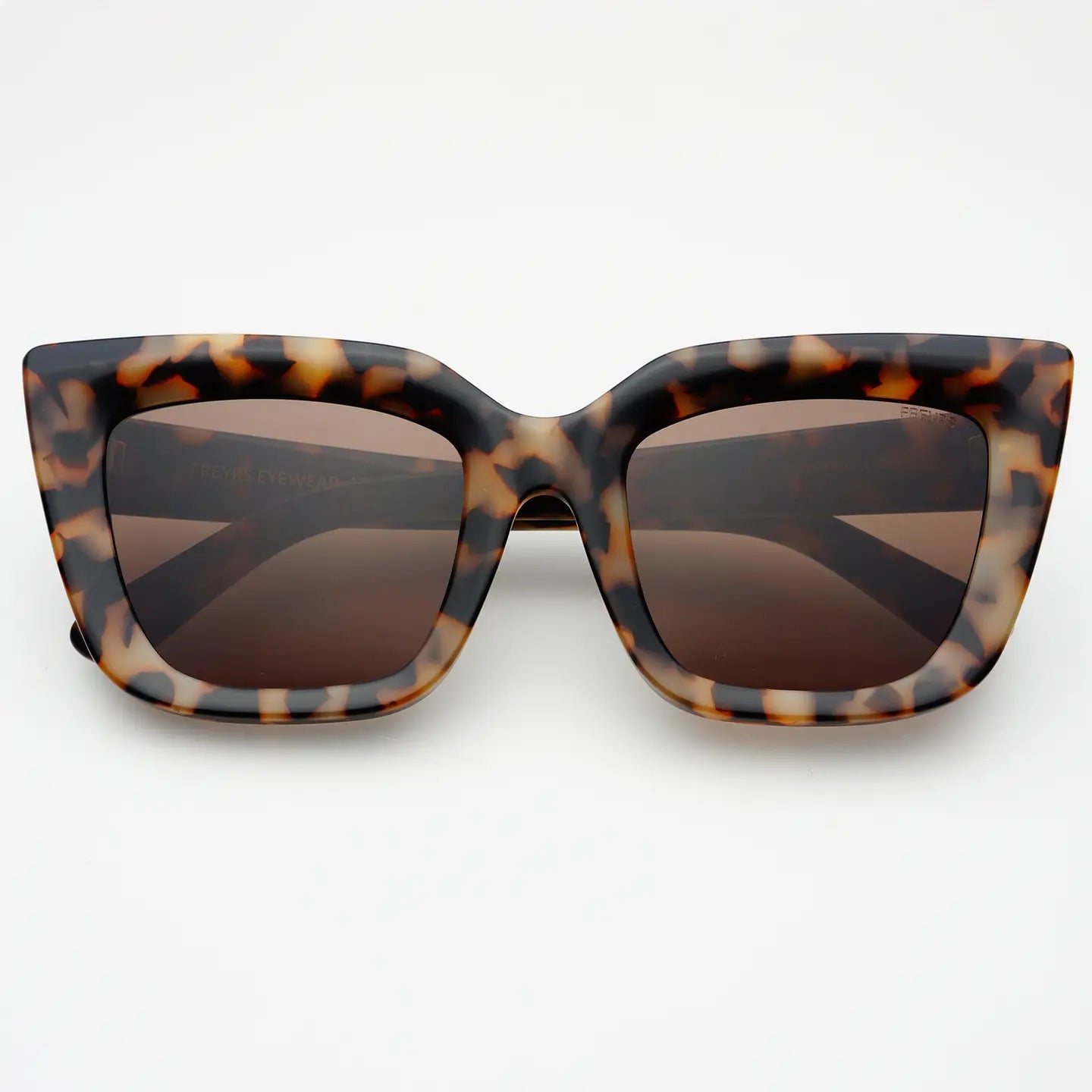 Tortoiseshell cat-eye sunglasses on a white background