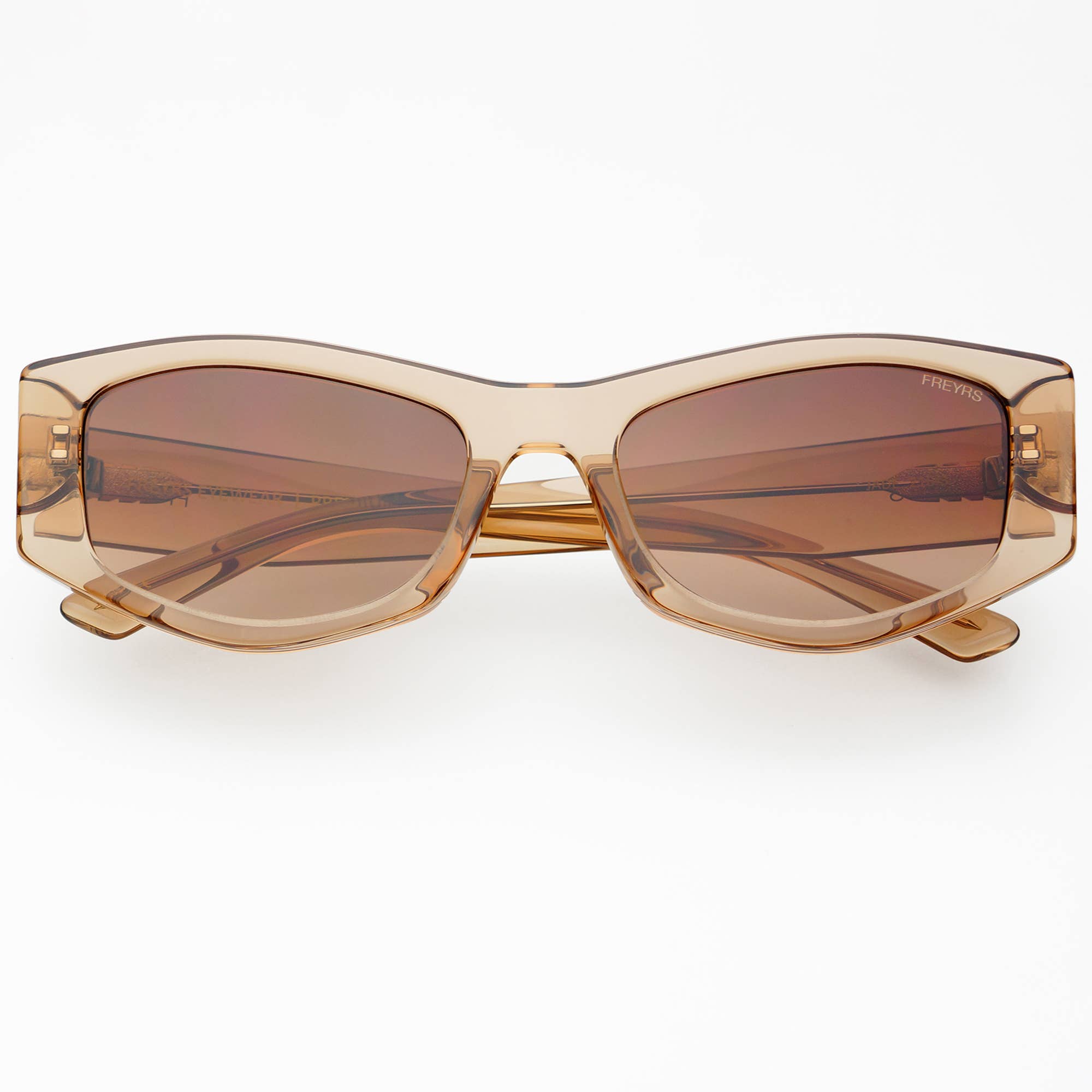 Gold-framed sunglasses with brown lenses on a white background