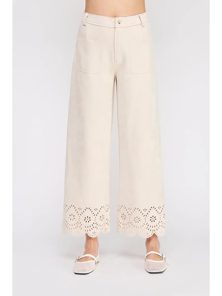 Beige wide-leg pants with lace detailing on a white background