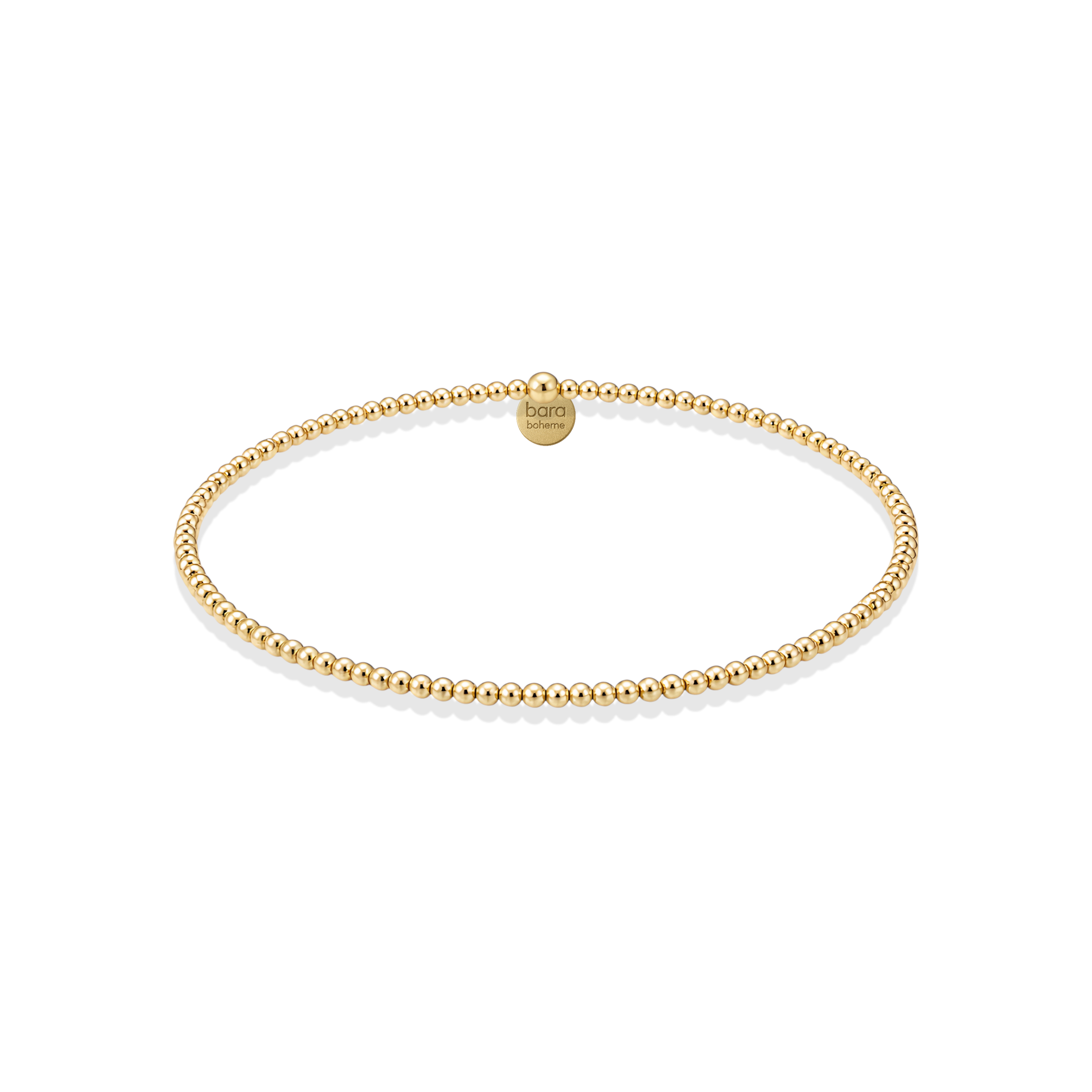 Gold beaded bracelet on a white background