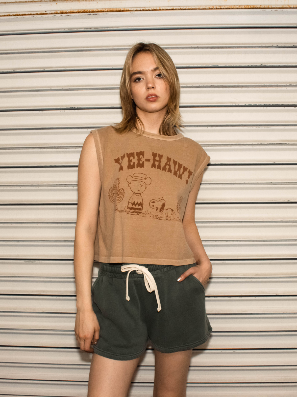 women wearing yee haw peanuts people of leisure tank top