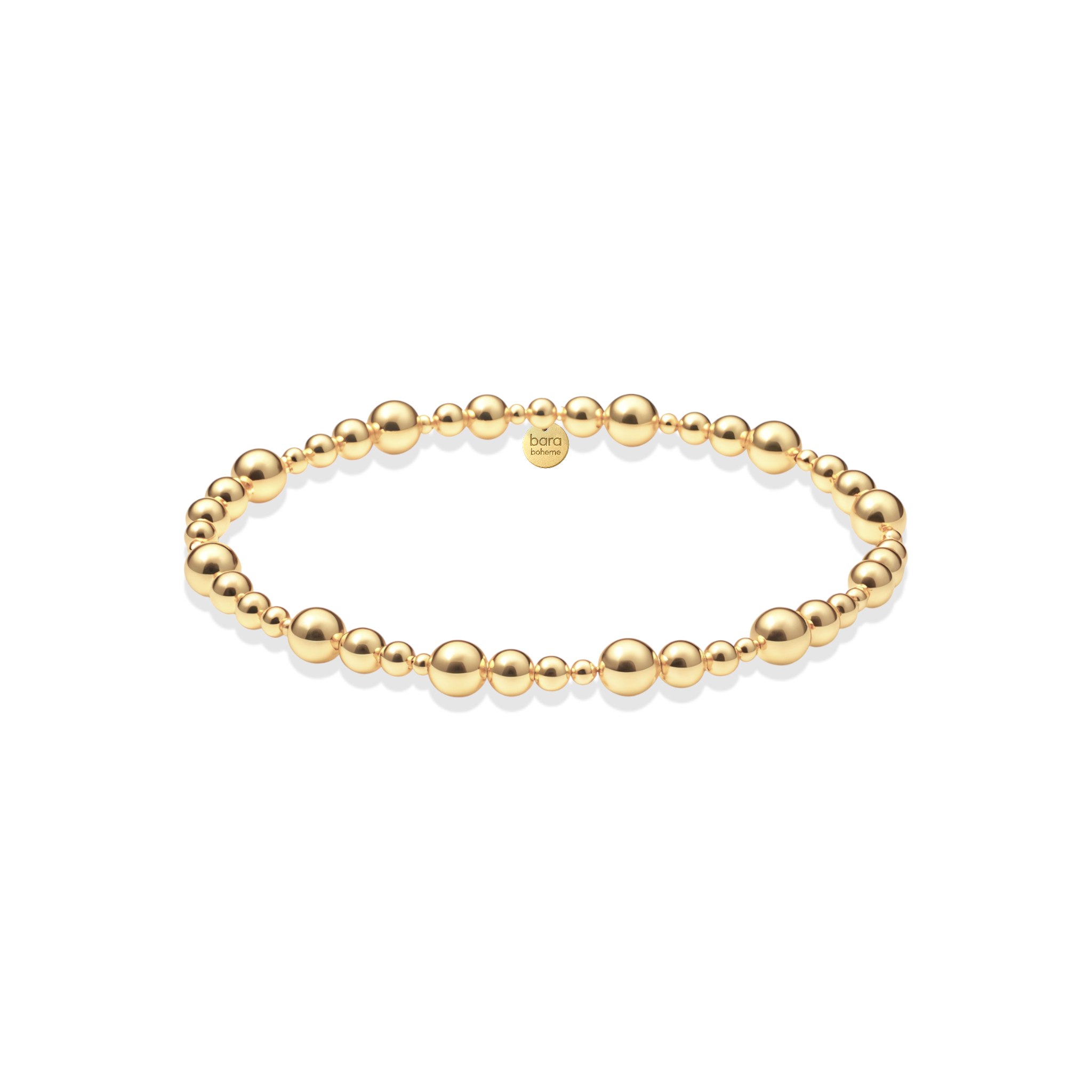 Gold beaded bracelet on a white background
