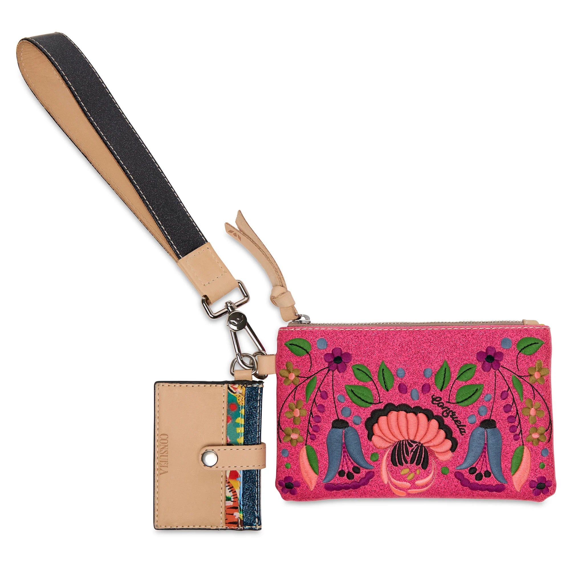 Pink pouch with floral design and strap on a white background