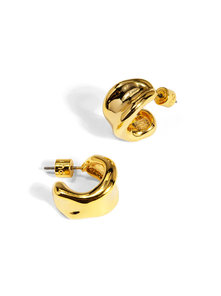 Gold hoop earrings on a white background