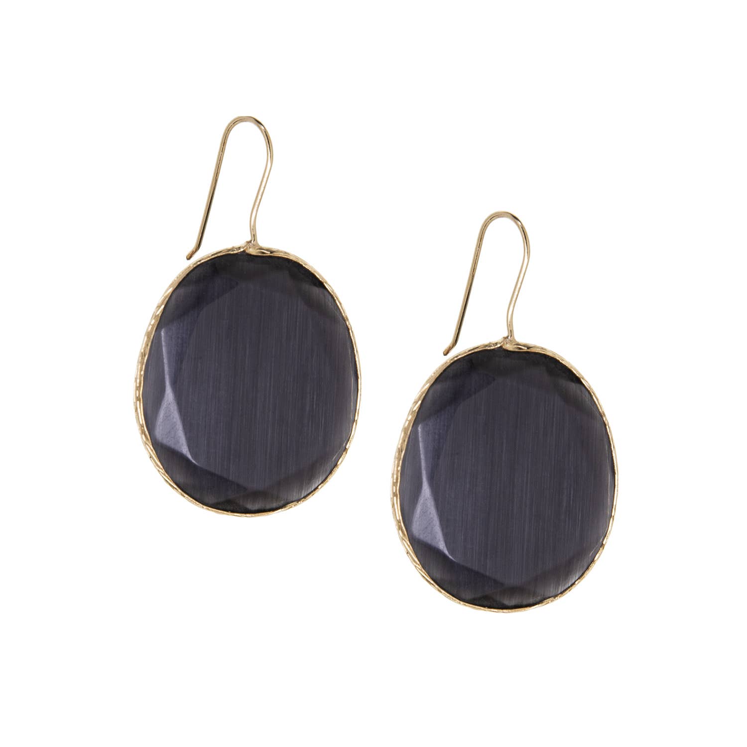 Pair of black oval earrings with gold rims on a white background