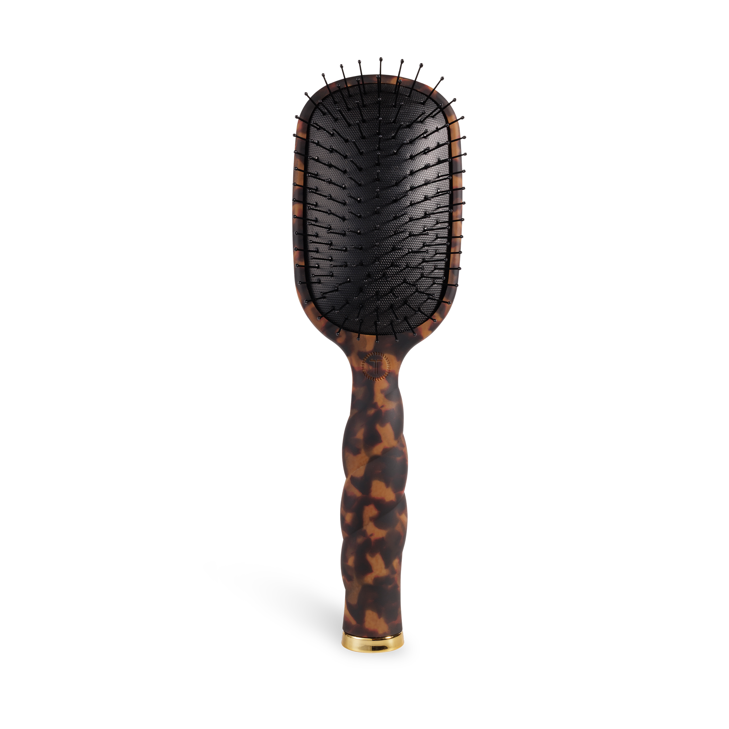 Hairbrush with tortoiseshell handle and gold accent on a white background