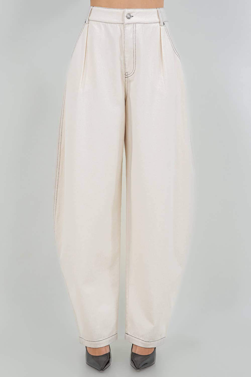 Beige wide-leg pants on a gray background