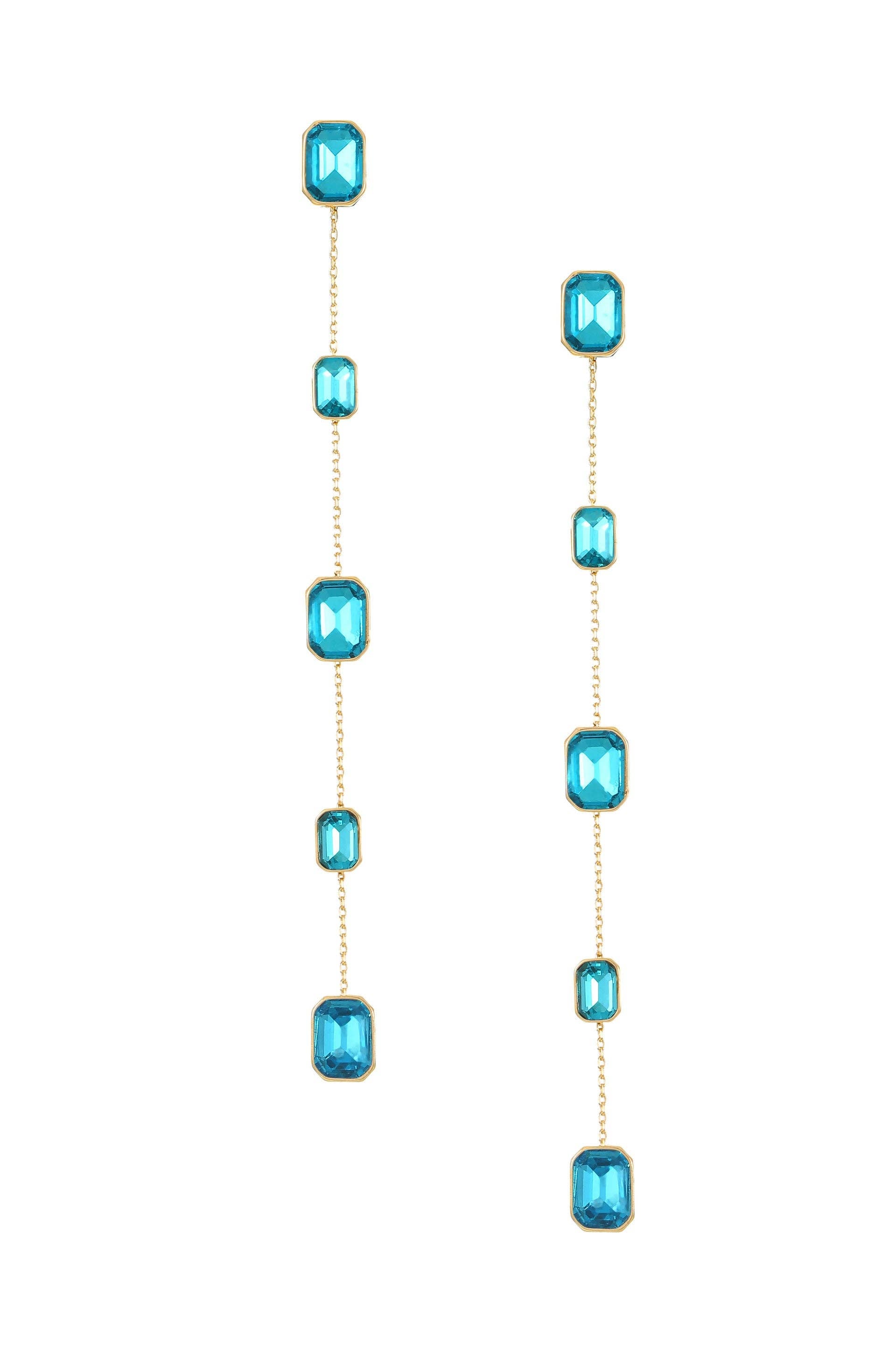 Long necklace with blue gemstones on a white background