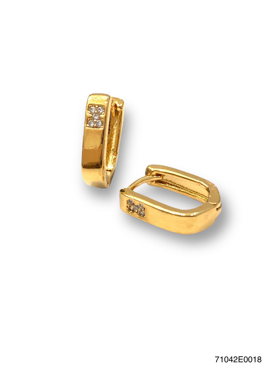 A pair of gold huggie hoop earrings with small clear gemstone accents, shown from two angles on a white background.