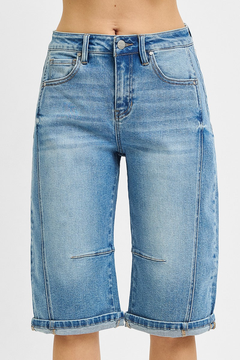 Blue denim shorts on a white background
