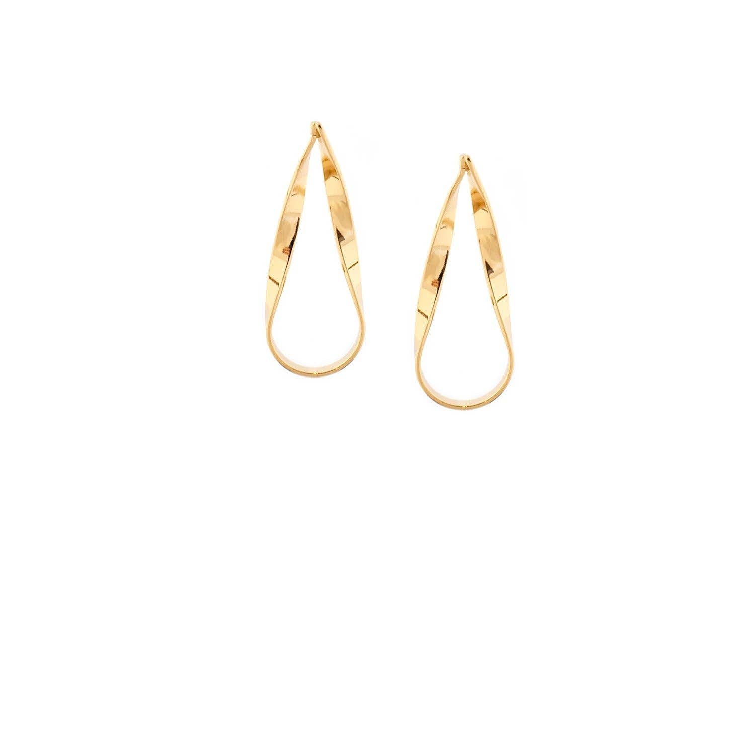 Gold hoop earrings on a white background