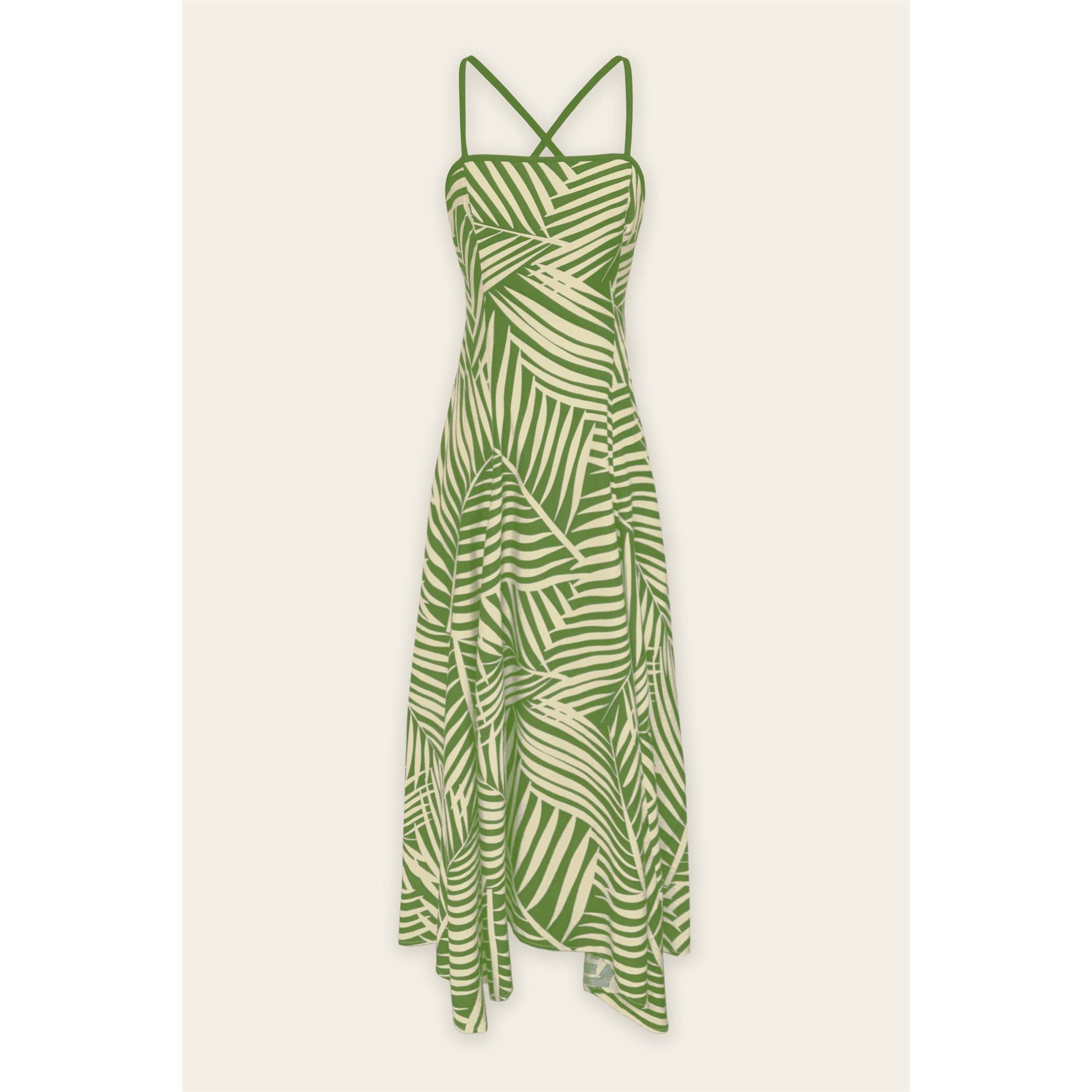 Green and white patterned dress on a light beige background
