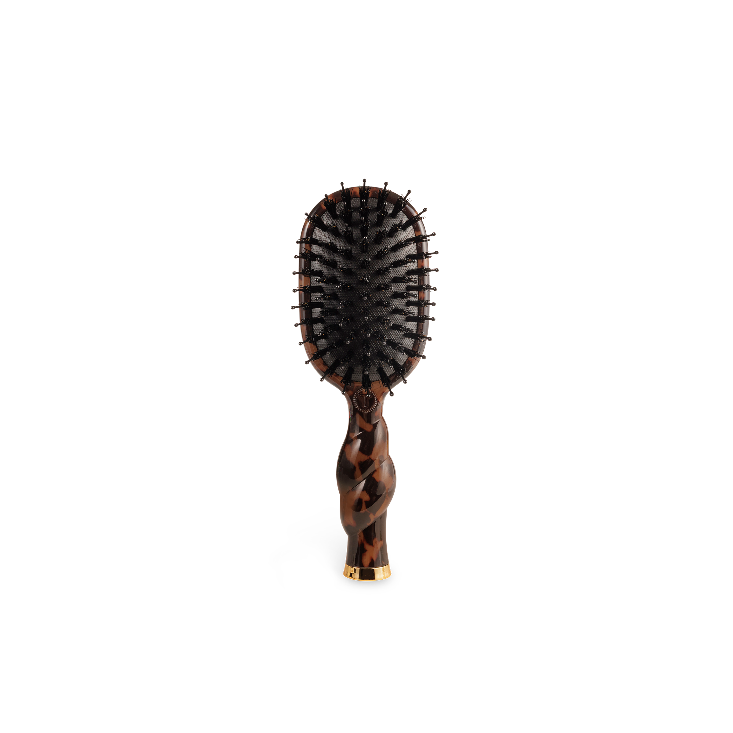 Hairbrush with tortoiseshell handle on a white background