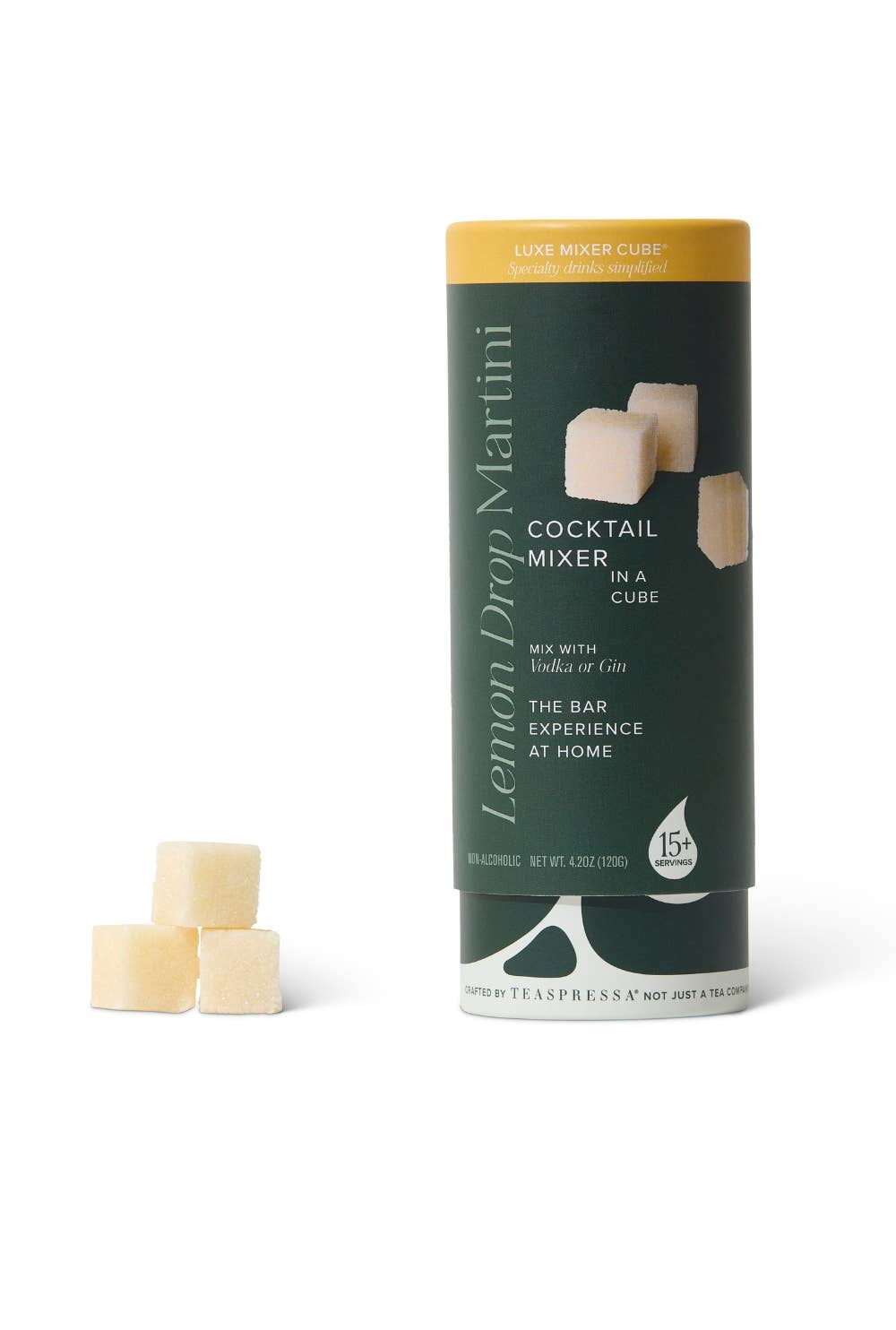 Cocktail mixer cubes in a cylindrical container on a white background