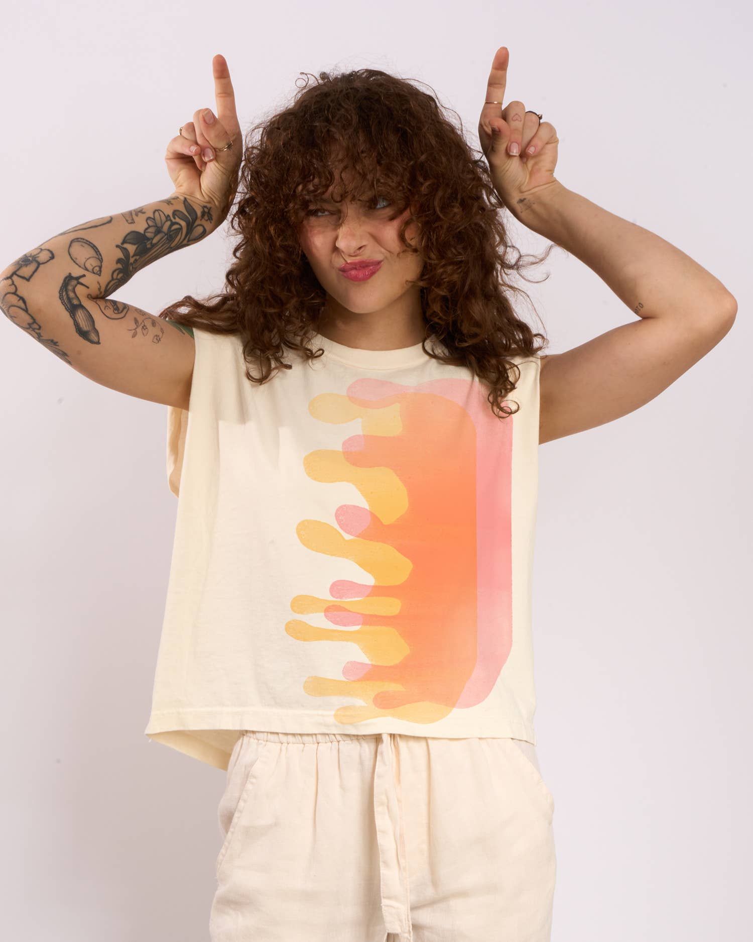 Women wearing graphic tee in sunset colors bozy fit cotton tshirt