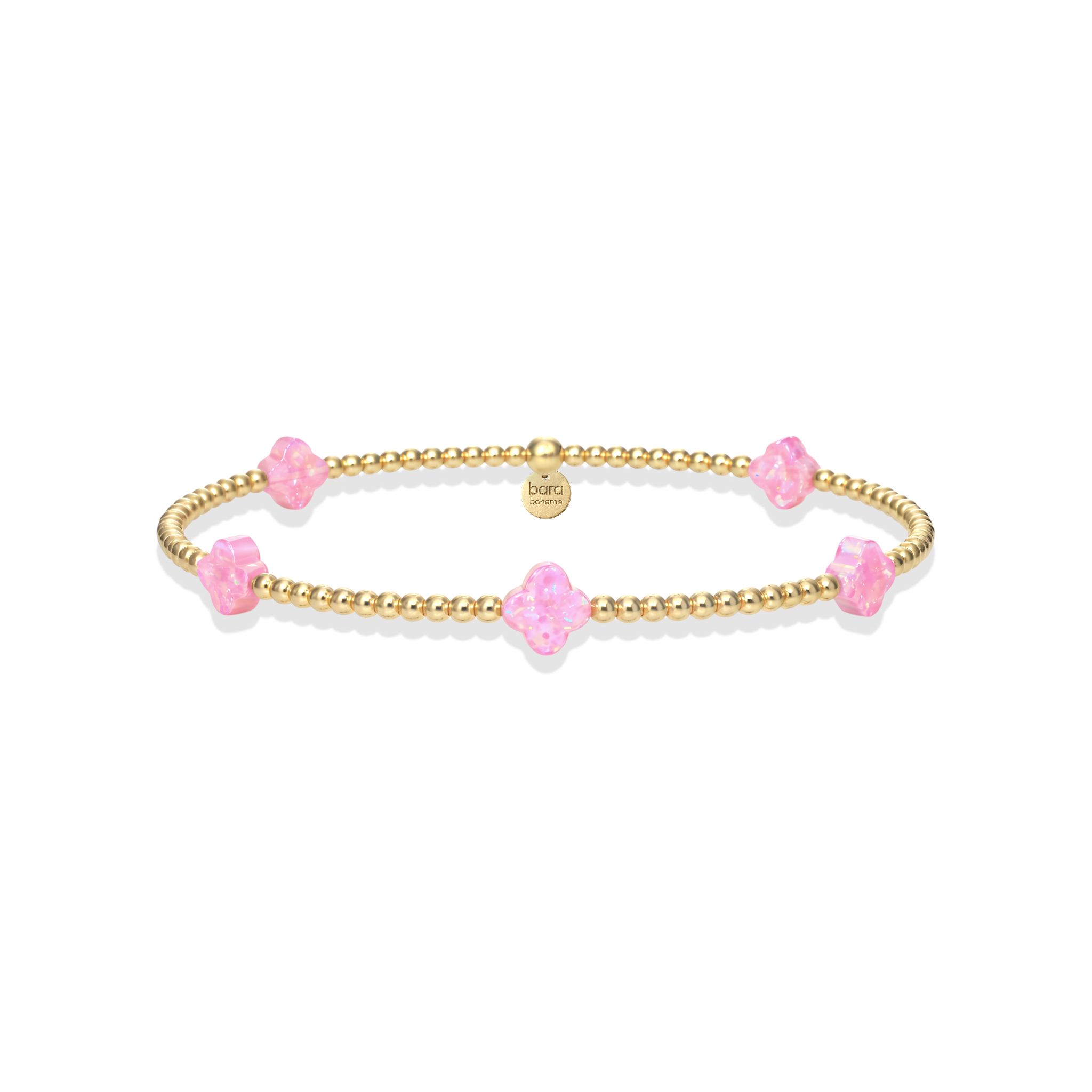 Gold bracelet with pink beads on a white background