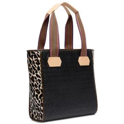 Black tote bag with leopard print pattern and brown handles on a white background