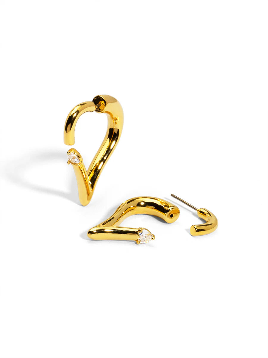 Gold hoop earrings on a white background