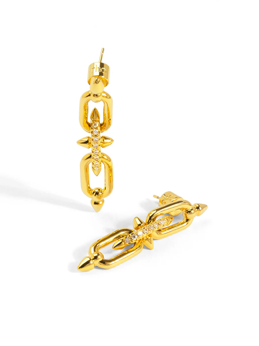 Gold chain-style earrings on a white background