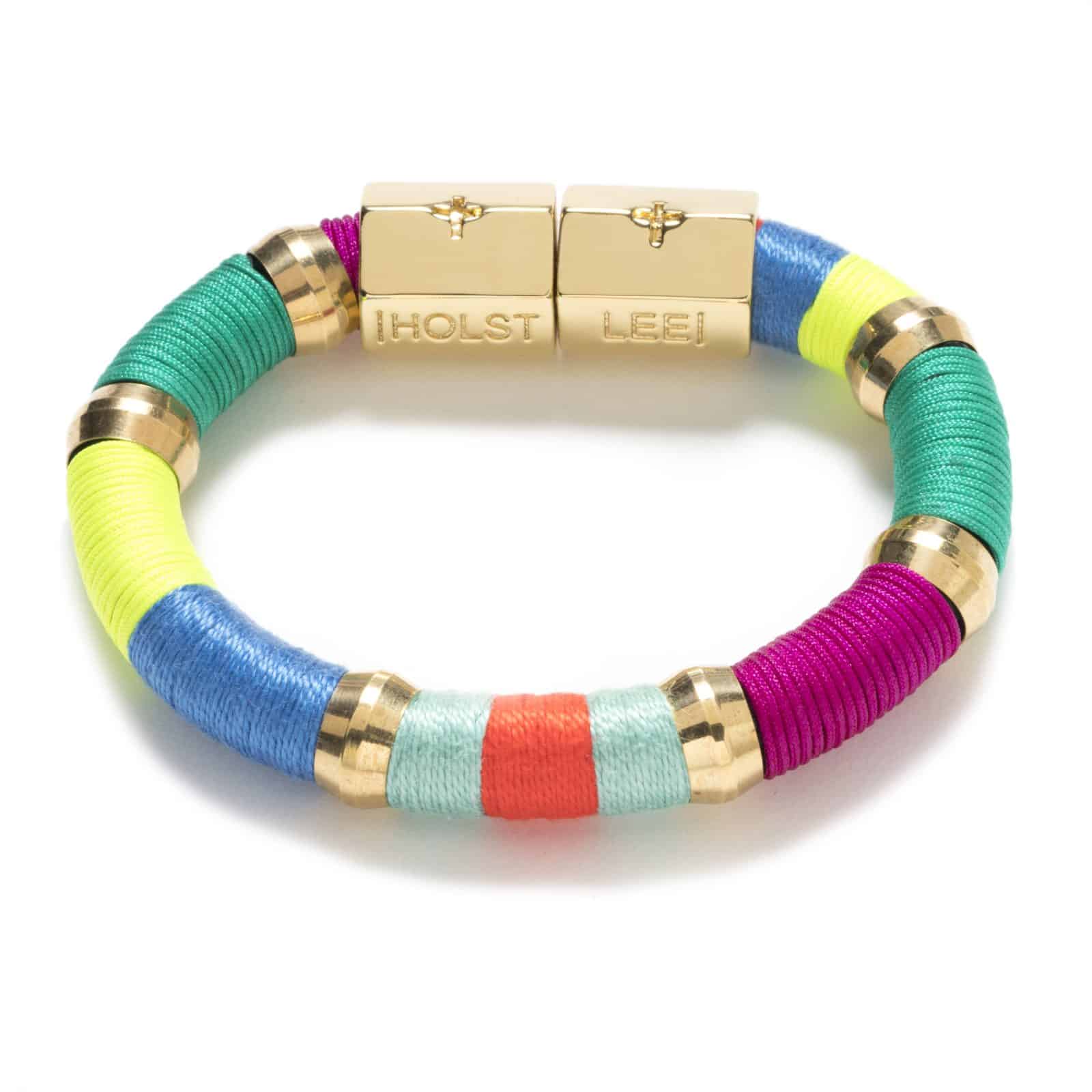 Colorful bracelet with gold clasp on a white background