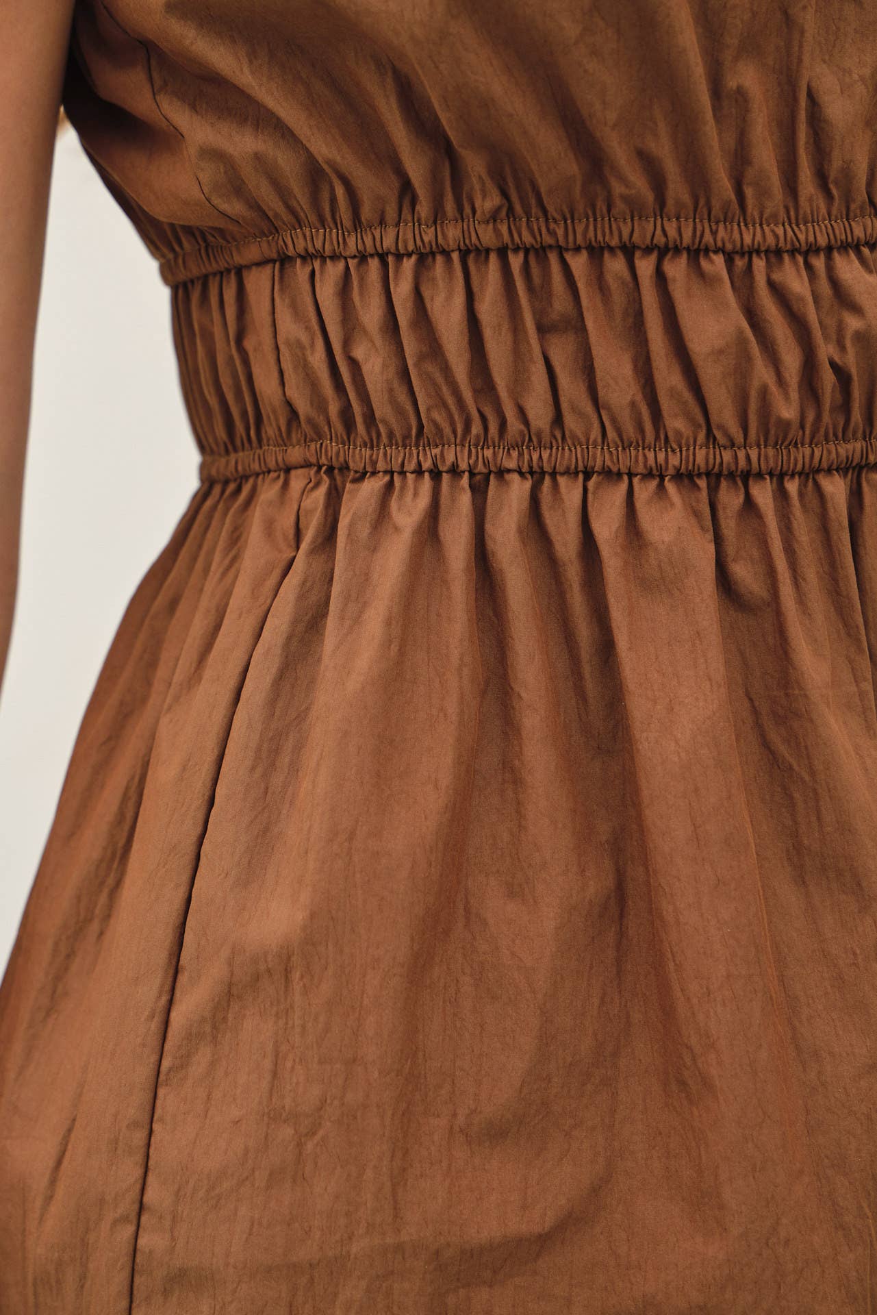RUCHED CAMI TOP W SOMKED WAIST AND PEPLUM HEM